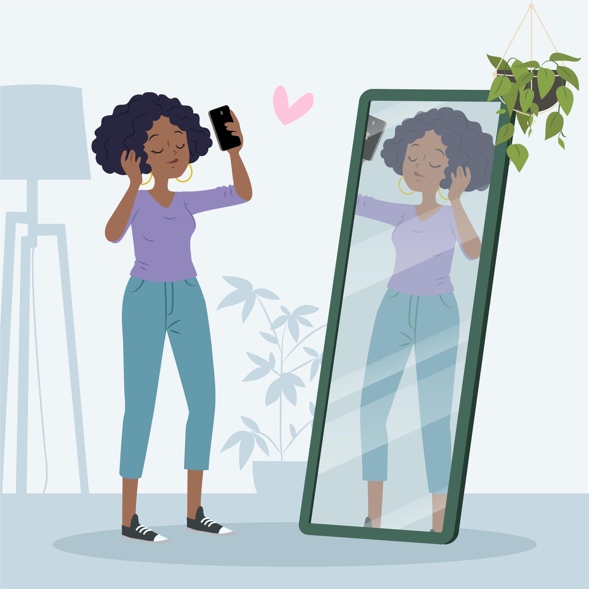 A woman standing in front of her mirror with high self-esteem